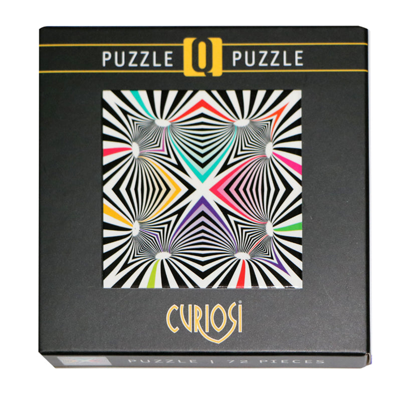 CURIOSI | Produktverpackung des Puzzle Q "Shake 3" mit schwarz-weißem, abstraktem Motiv und bunten Farbakzenten