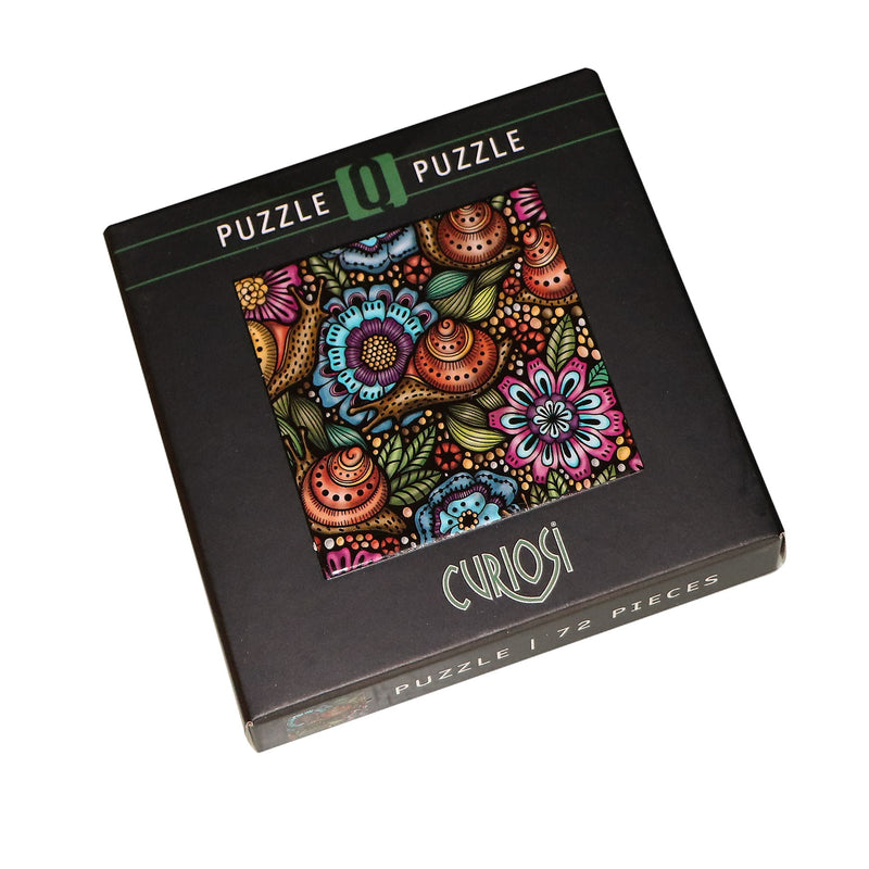 CURIOSI | Produktverpackung des Puzzle Q "Life 4" mit Schnecken auf abstrakten Blumen als Motiv 