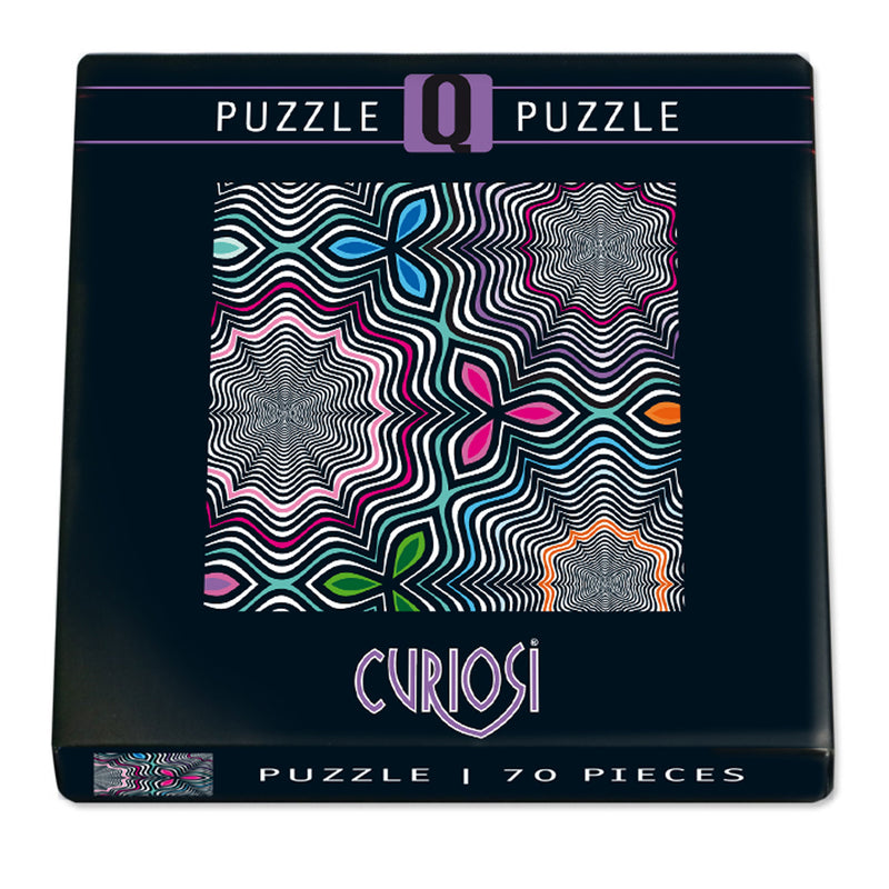 CURIOSI | Frontansicht der Produktverpackung des Puzzle Q "POP 3" mit schwarz-weißen blumenartigen Formen und bunten Akzenten