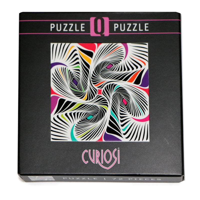 CURIOSI | Produktverpackung des Puzzle Q "Shake 2" mit schwarz-weißem, abstraktem Motiv und bunten Farbakzenten