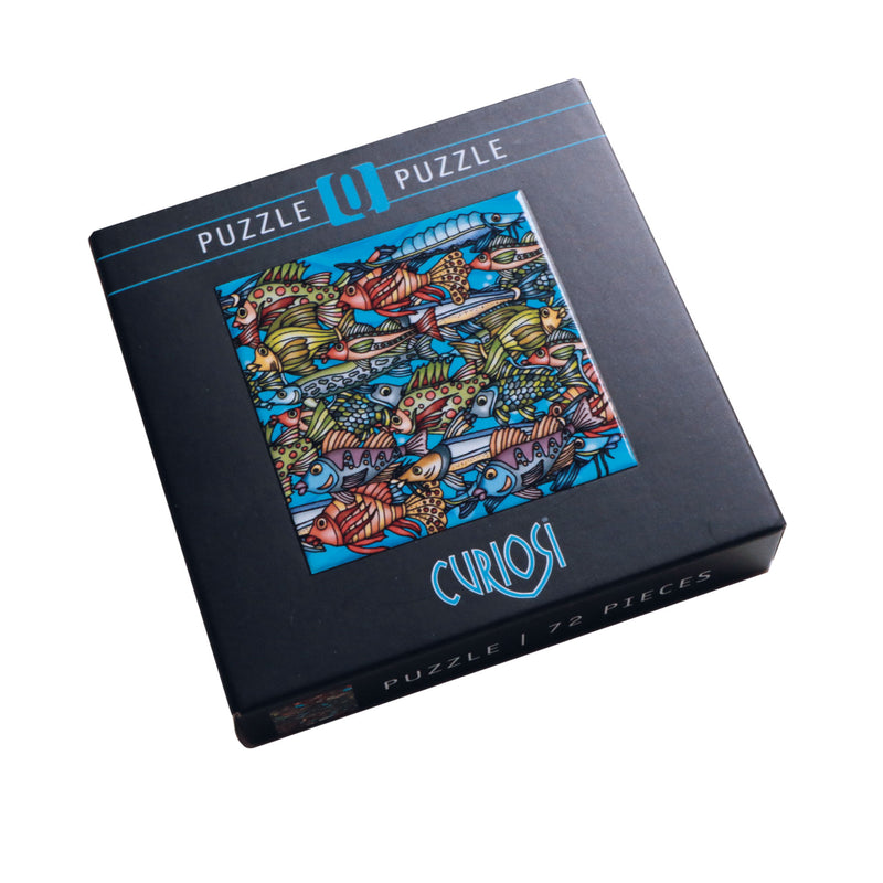 CURIOSI | Produktverpackung des Puzzle "Color Mix 1" mit bunten Fischen als Motiv