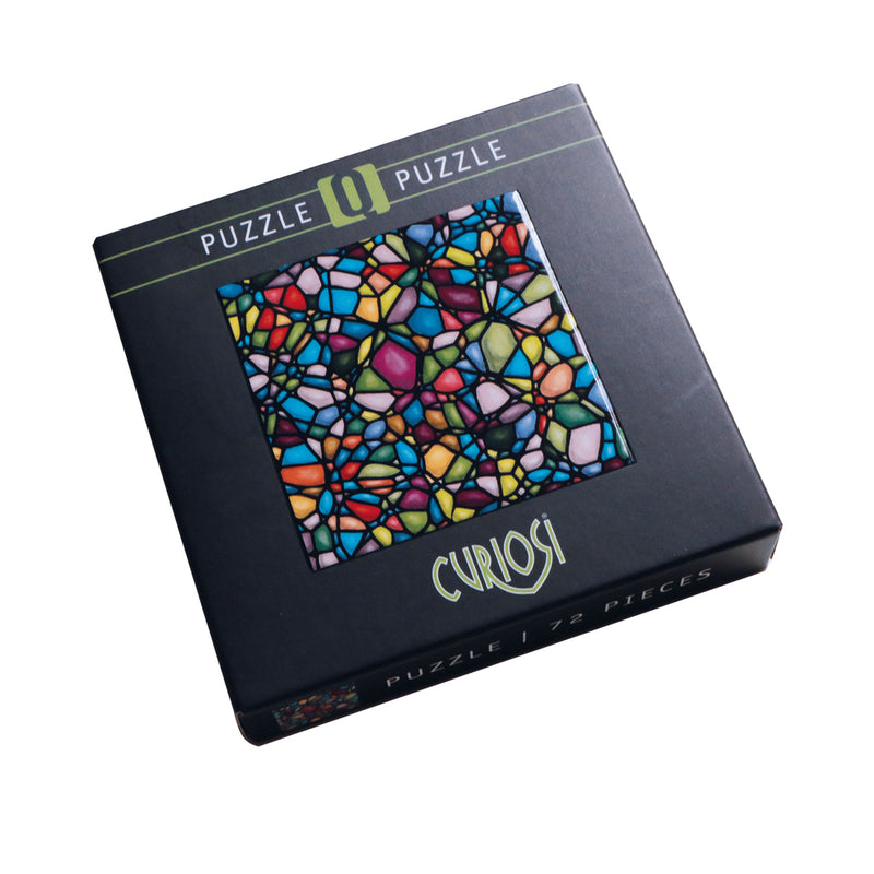 CURIOSI | Produktverpackung des Puzzles Q "Color Mix 4" mit einem schönen Mandala ähnlichen bunt gestalteten  Motiv